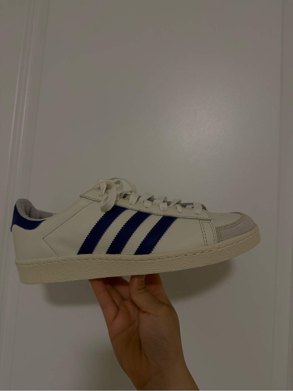 Adidas Men’s White Leather Sneaker with Navy Stripes